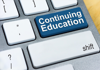 "Continuing Education" written on a keyboard key