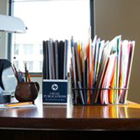 Image of a desk with a file folder on top