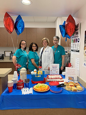 Brazos County employee clinic staff at one year opening anniversary celebration